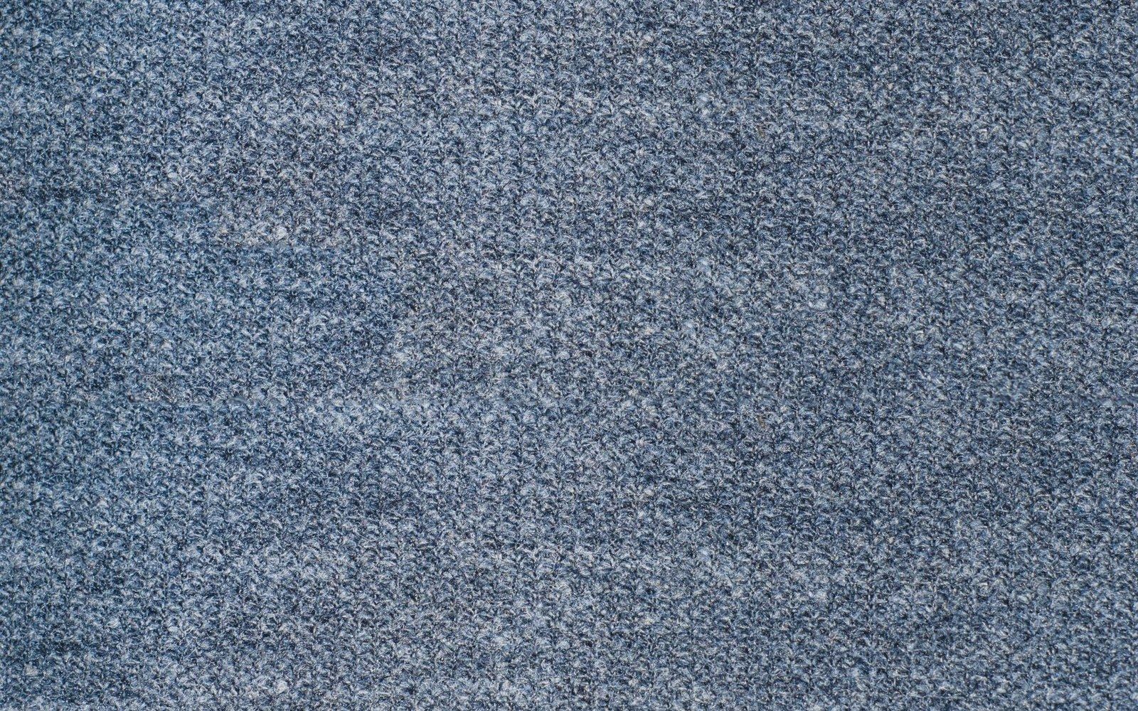 Close-up of woven blue-gray polyester fabric with a flecked textured surface